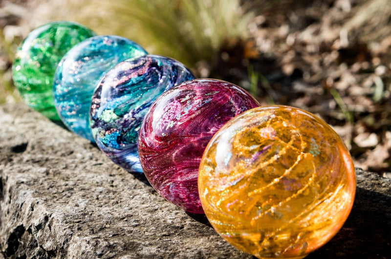 glass orb with cremation ash